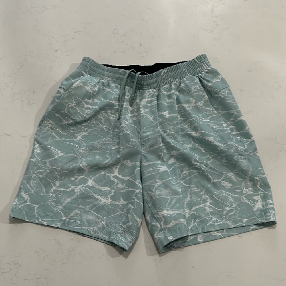 Lightly used lulu swim short with liner, 7inch inseam